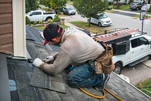 Professional Roofing technician working in Westlake, OR
